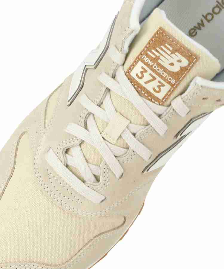 New balance ml373 mens 2025 gold