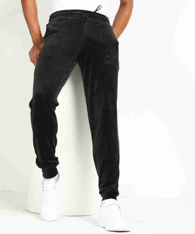 PUMA Pants Solid Men Black Track Pants - Buy PUMA Pants Solid Men Black  Track Pants Online at Best Prices in India