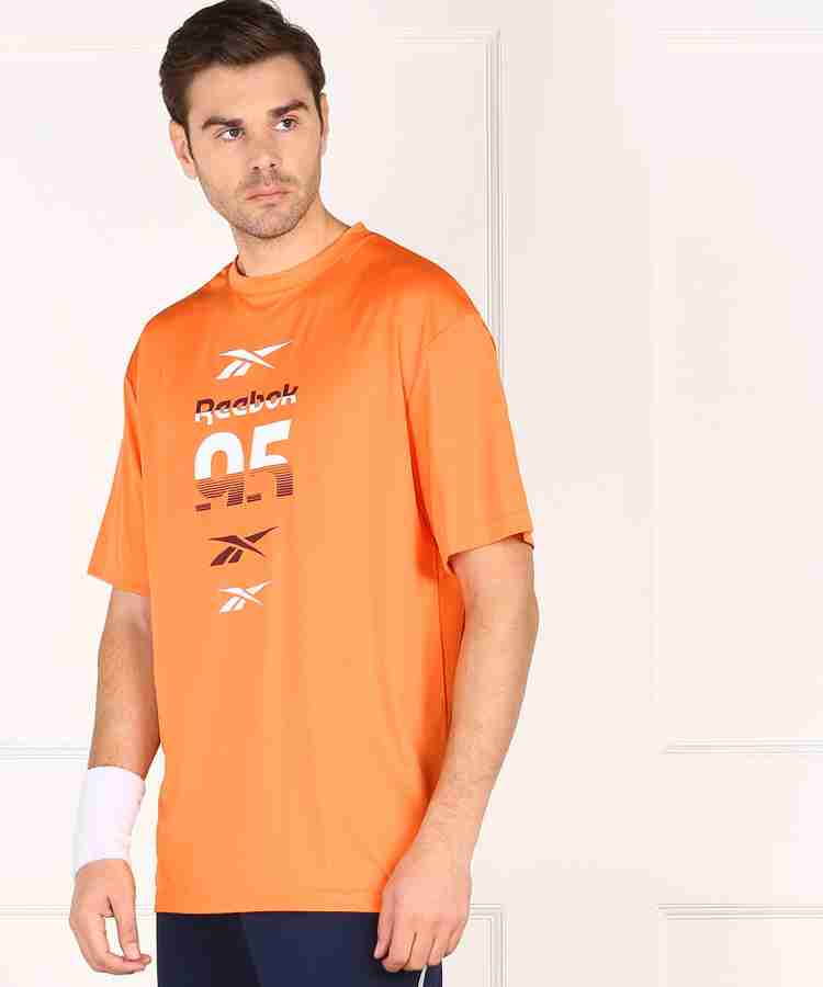 Reebok orange t hot sale shirt