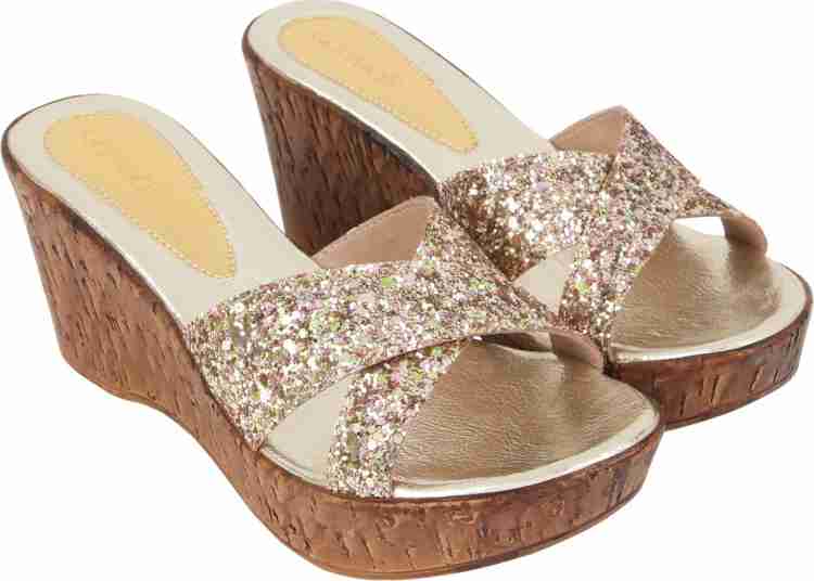 Catwalk on sale gold wedges