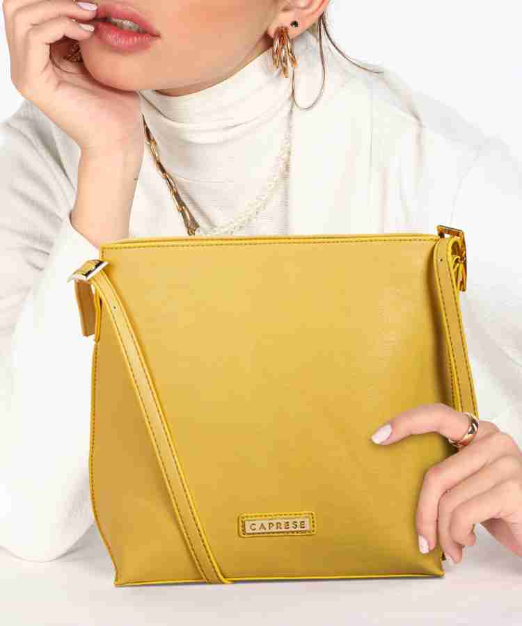 Caprese yellow sling bag sale