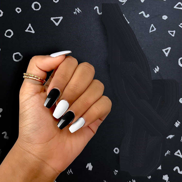 Stylish black nail art designs to keep your style on track : black dripped white  nails