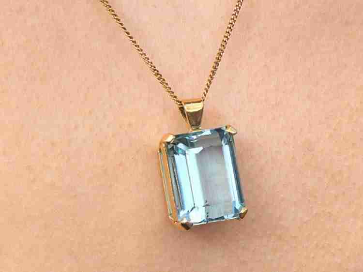 Gold necklace deals with aquamarine stone