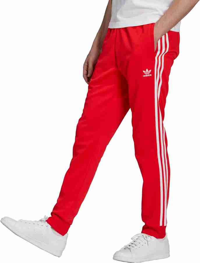 Adidas red training pants online