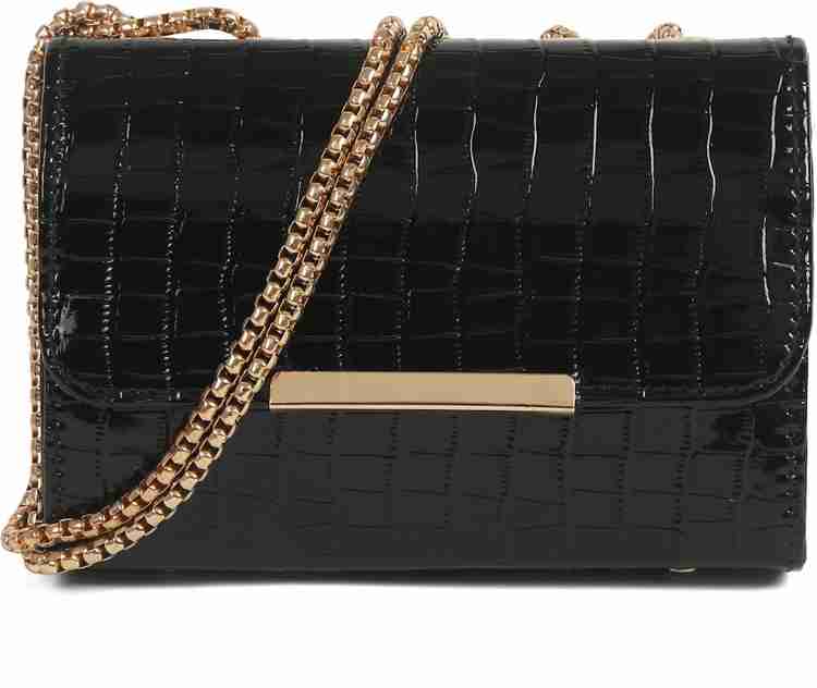 Black sling bag with gold on sale chain