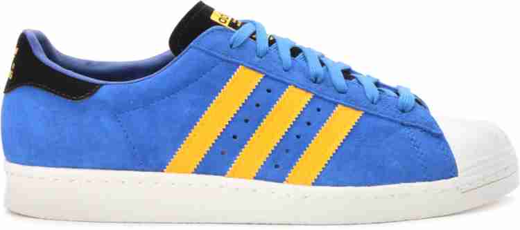 Adidas superstar hot sale blue and yellow