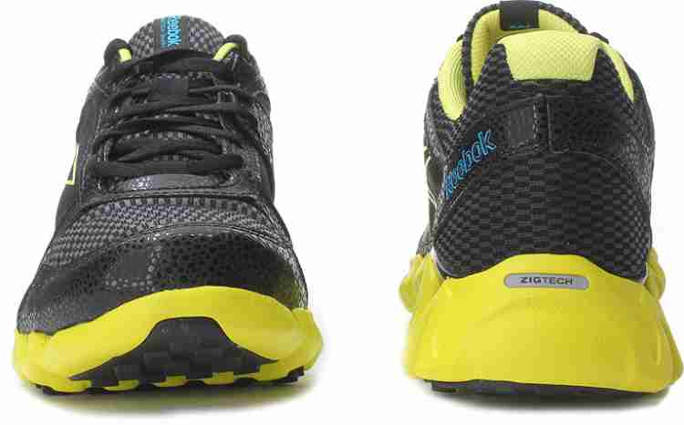 Black and yellow outlet reebok zigtech