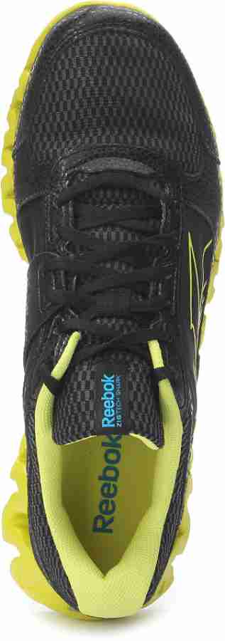 Black and yellow outlet reebok zigtech