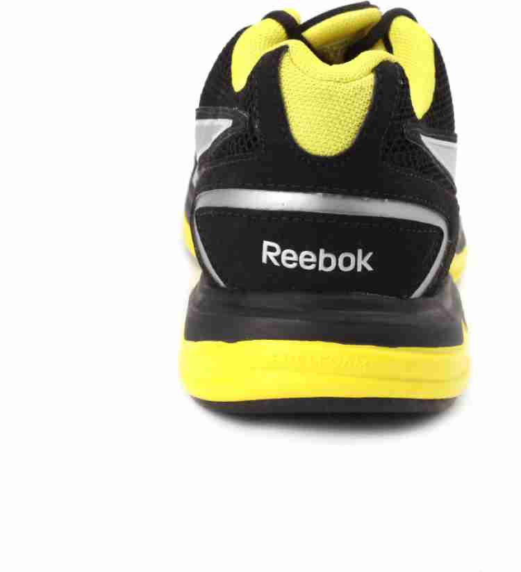 Black and yellow outlet reebok shoes