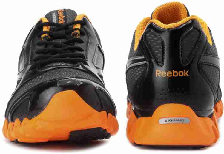 REEBOK Zignano Race LP Running Shoes For Men Buy Black Grey Orange Color REEBOK Zignano Race LP Running Shoes For Men Online at Best Price Shop Online for Footwears in