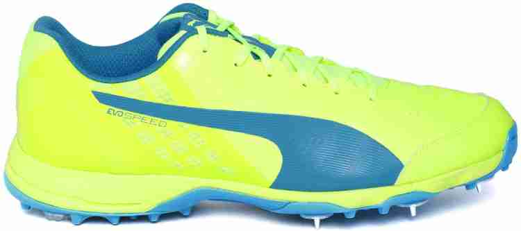 Puma pink fluorescent green sales cricket shoes