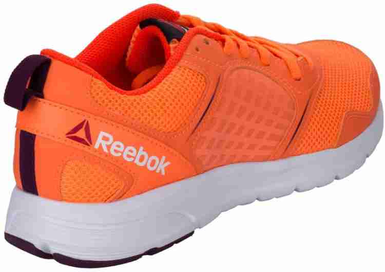 Orange reebok sales shoes