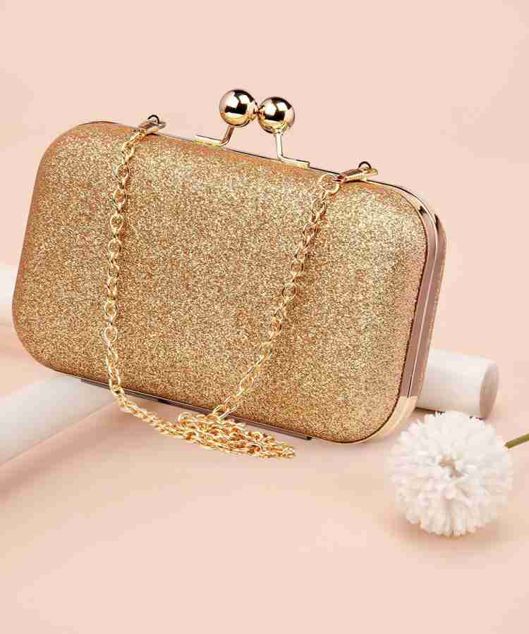 Small gold threded clutch bag