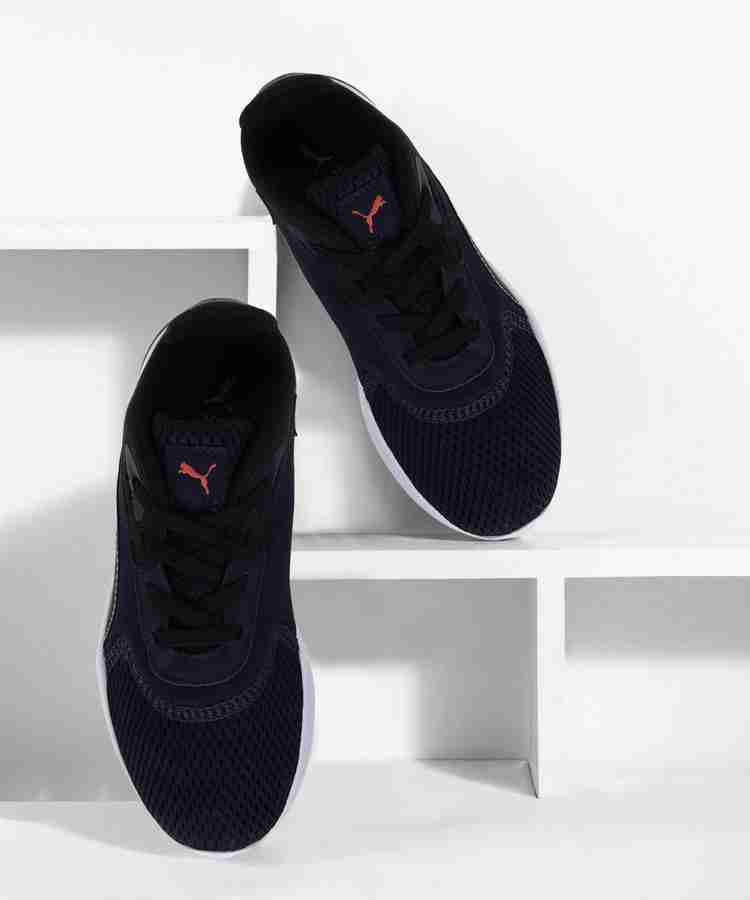 Puma sports shoes for kids top