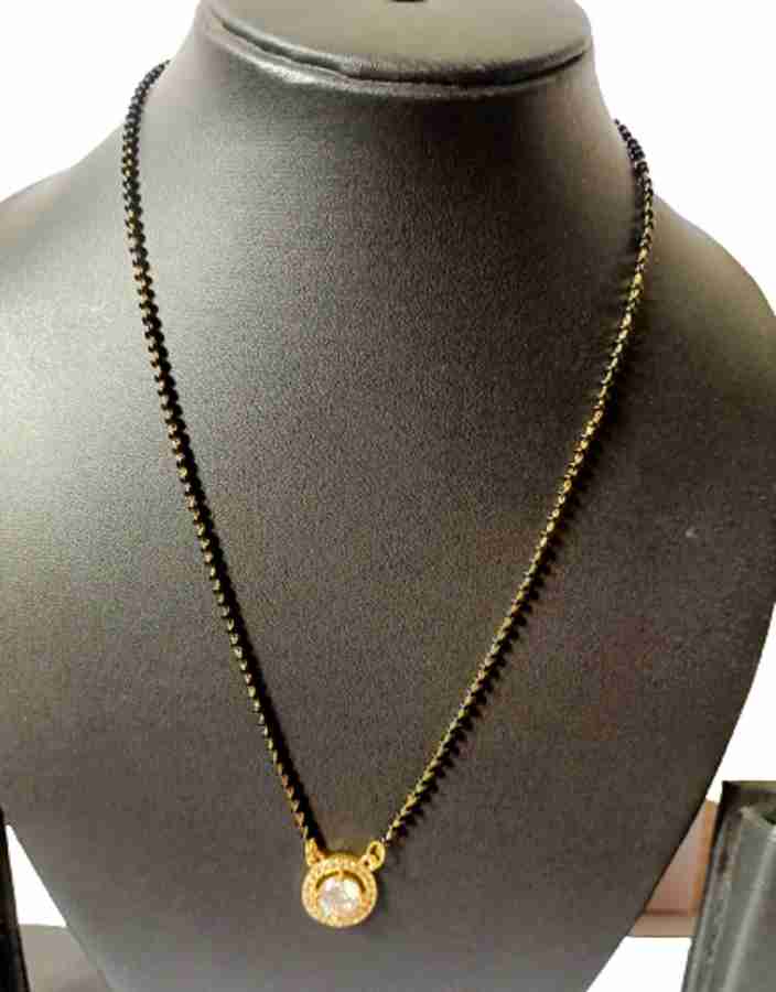 Haryali Round stone black beaded 18 inch single mangalsutra chain for woman Alloy Mangalsutra Price in India Buy Haryali Round stone black beaded 18 inch single mangalsutra chain for woman Alloy