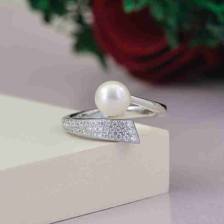 Real pearl ring in silver shop