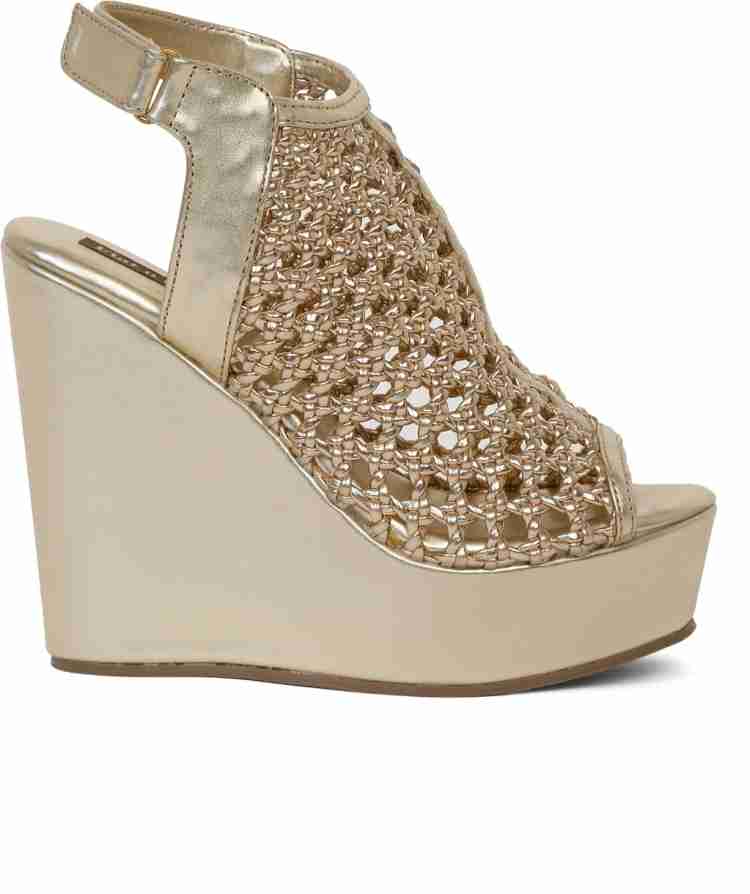 Metallic gold wedge discount heels