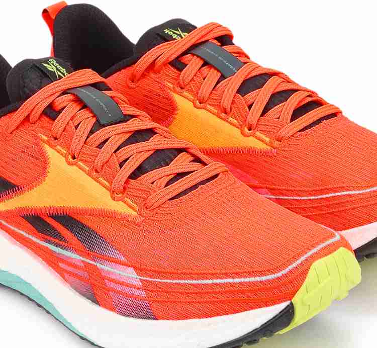 Orange reebok sneakers hotsell