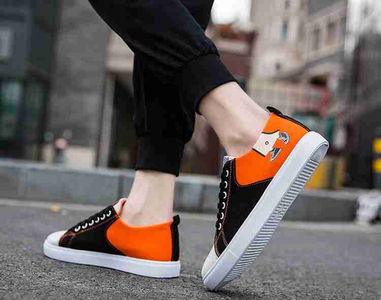 Black orange hot sale sneakers