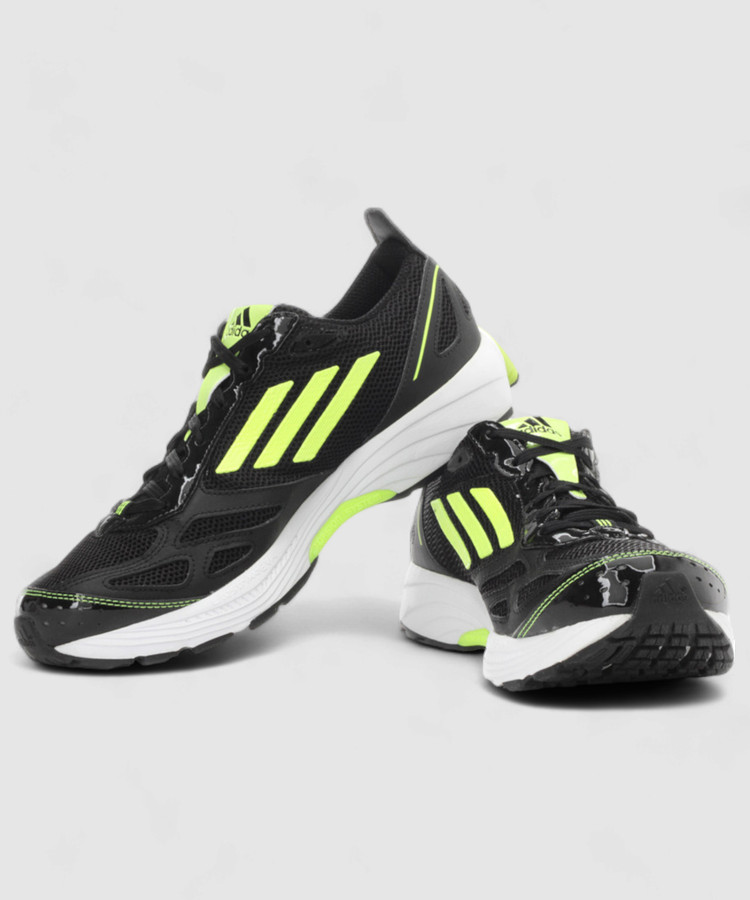 black and neon green adidas