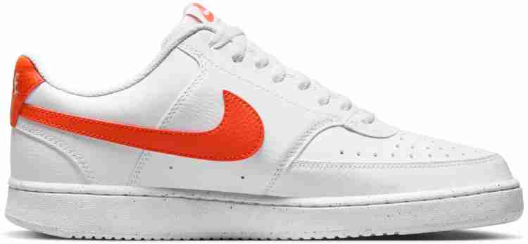 Orange and store white nike shoes