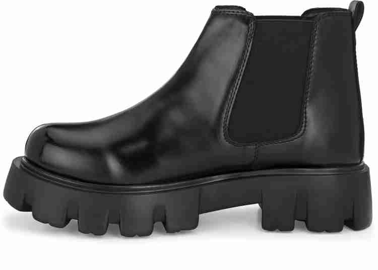 Black chunky chelsea boots deals