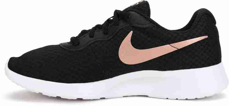 Nike tanjun hot sale womens black