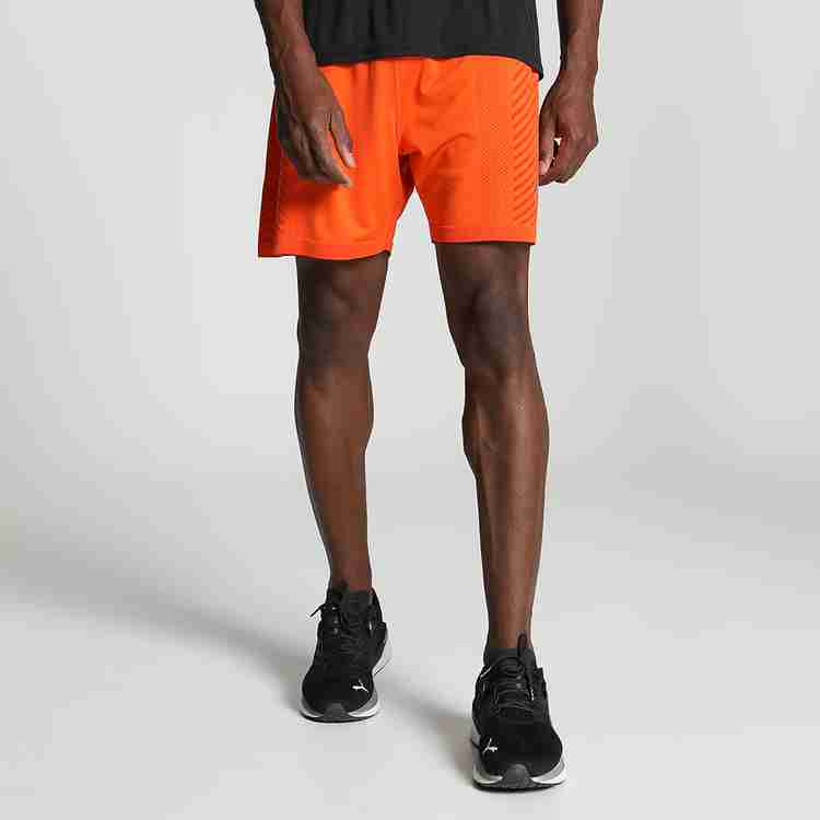 Orange puma shorts sale