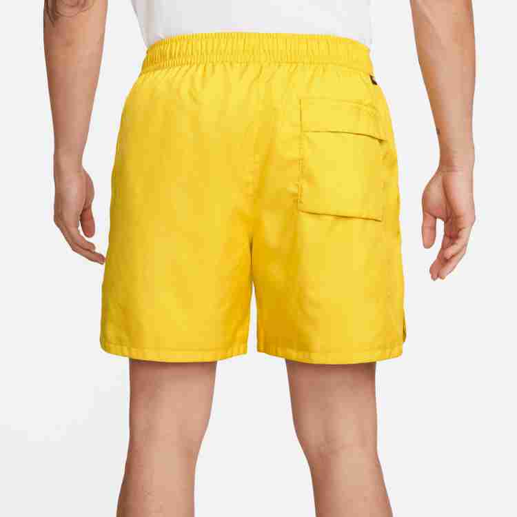Nike large swoosh shorts yellow 2025