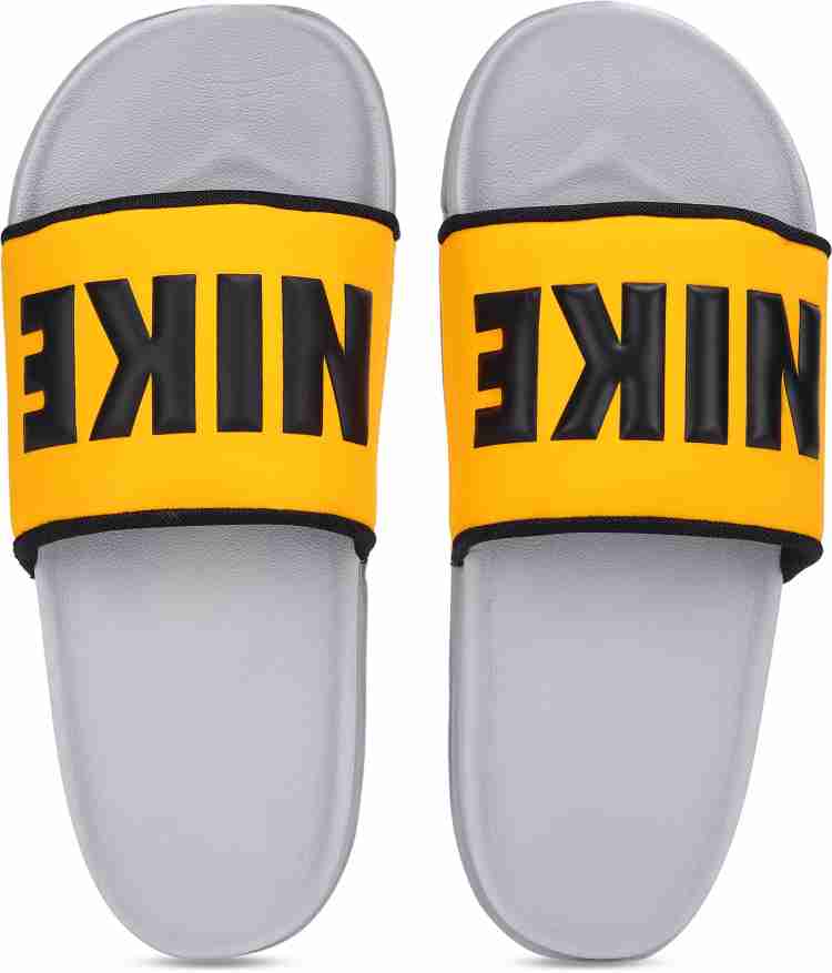 Yellow store nike slides