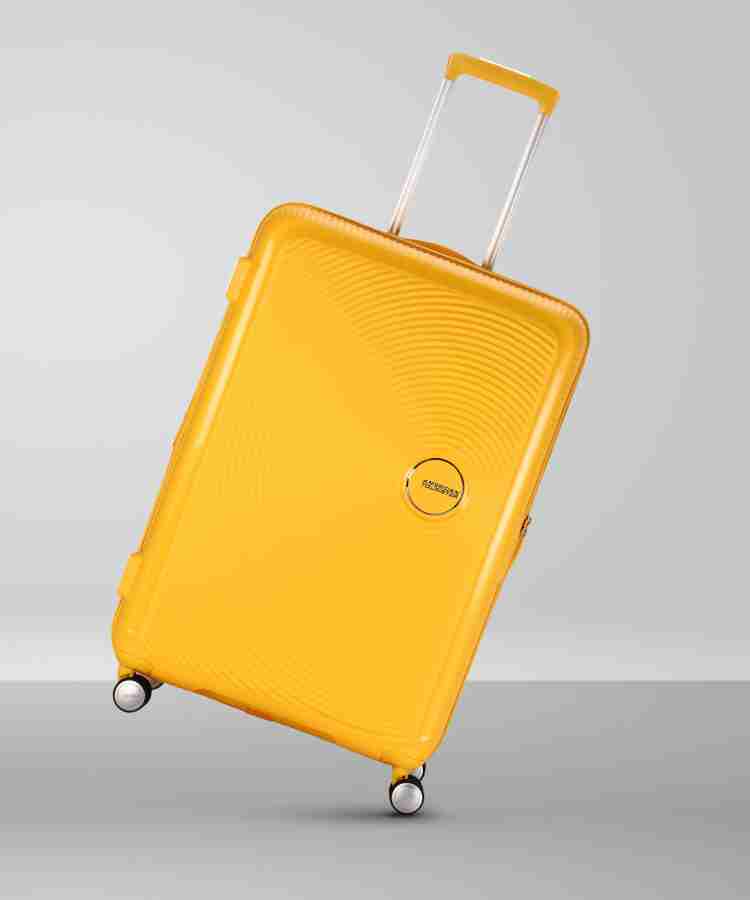 AMERICAN TOURISTER Curio Spinner Expandable Check in Suitcase 4 Wheels 31 inch Yellow Price in India Flipkart