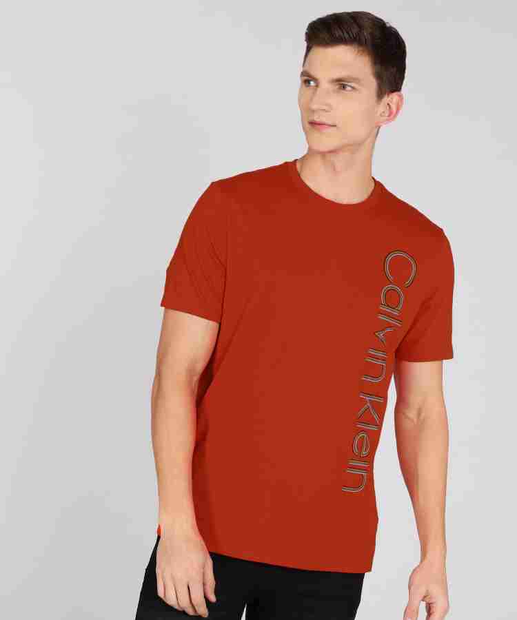 Calvin klein orange on sale shirt