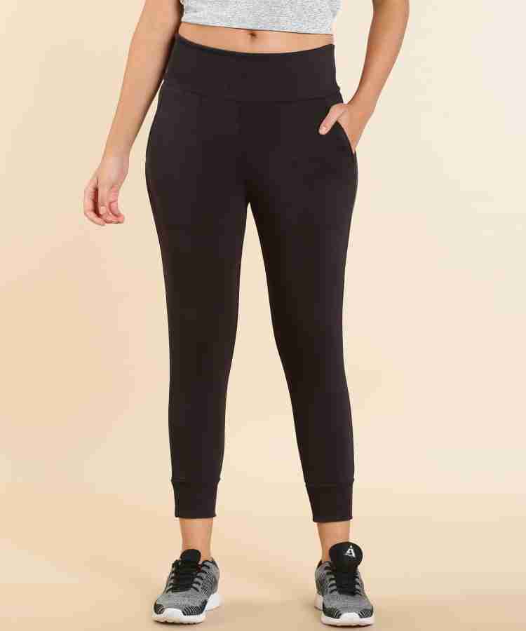 NIKE Solid Women Black Track Pants - Buy NIKE Solid Women Black Track Pants  Online at Best Prices in India