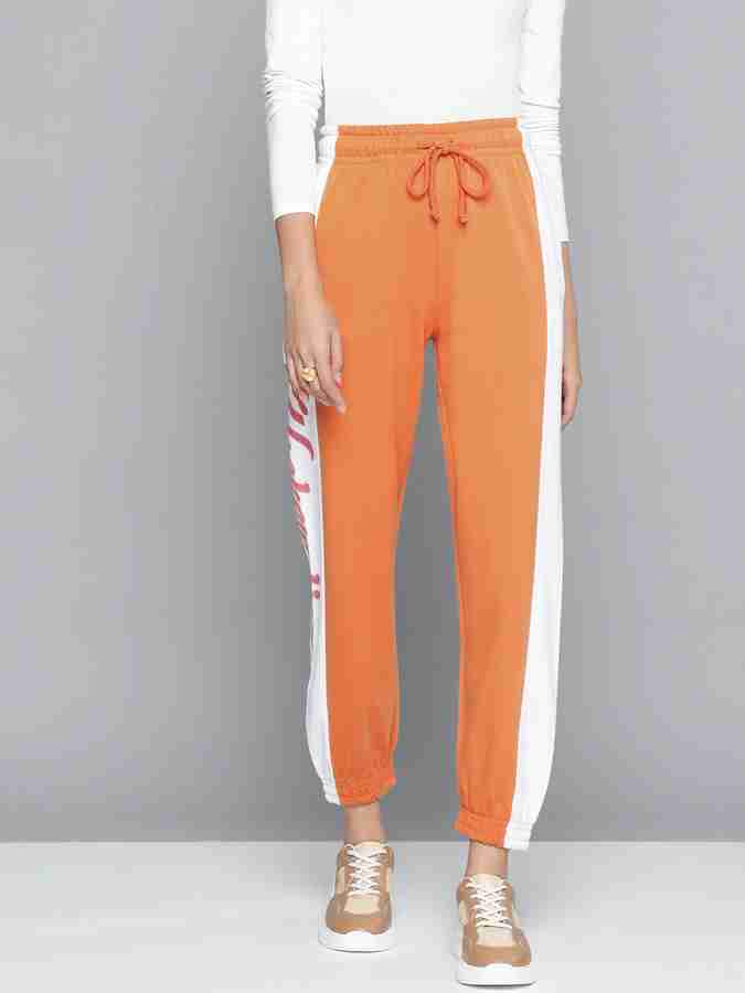 Orange track sale pants womens