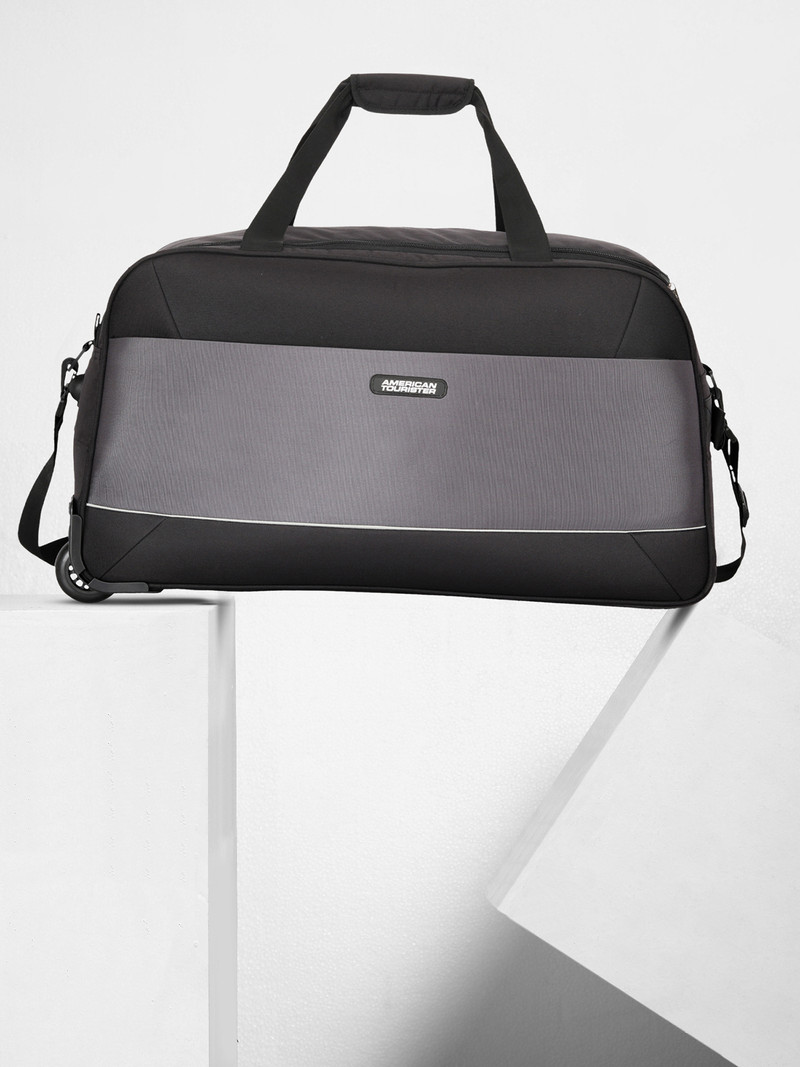 American Tourister AMERICAN TOURISTER 41 L Strolley Duffel Bag - POLER WHEEL DUFFLE 55CM BLACK - Black - Regular Capacity