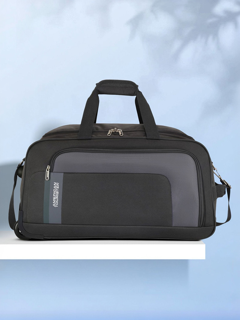 American Tourister AMERICAN TOURISTER 56 L Strolley Duffel Bag - CAMP WHEEL 57cm - GREY - Grey - Large Capacity
