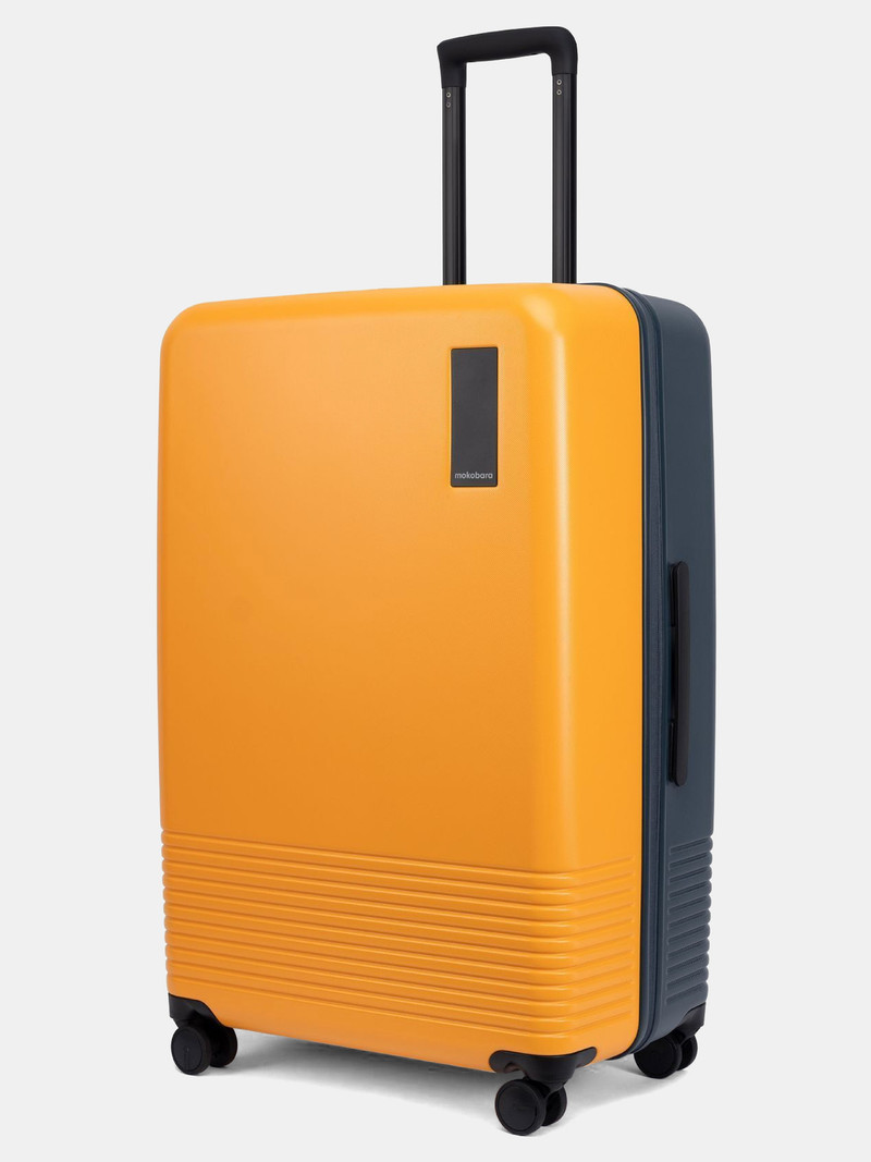 Mokobara Mokobara Large Check-in Suitcase (79 cm) 8 Wheels - The Check-in Large Luggage - Orange, Blue