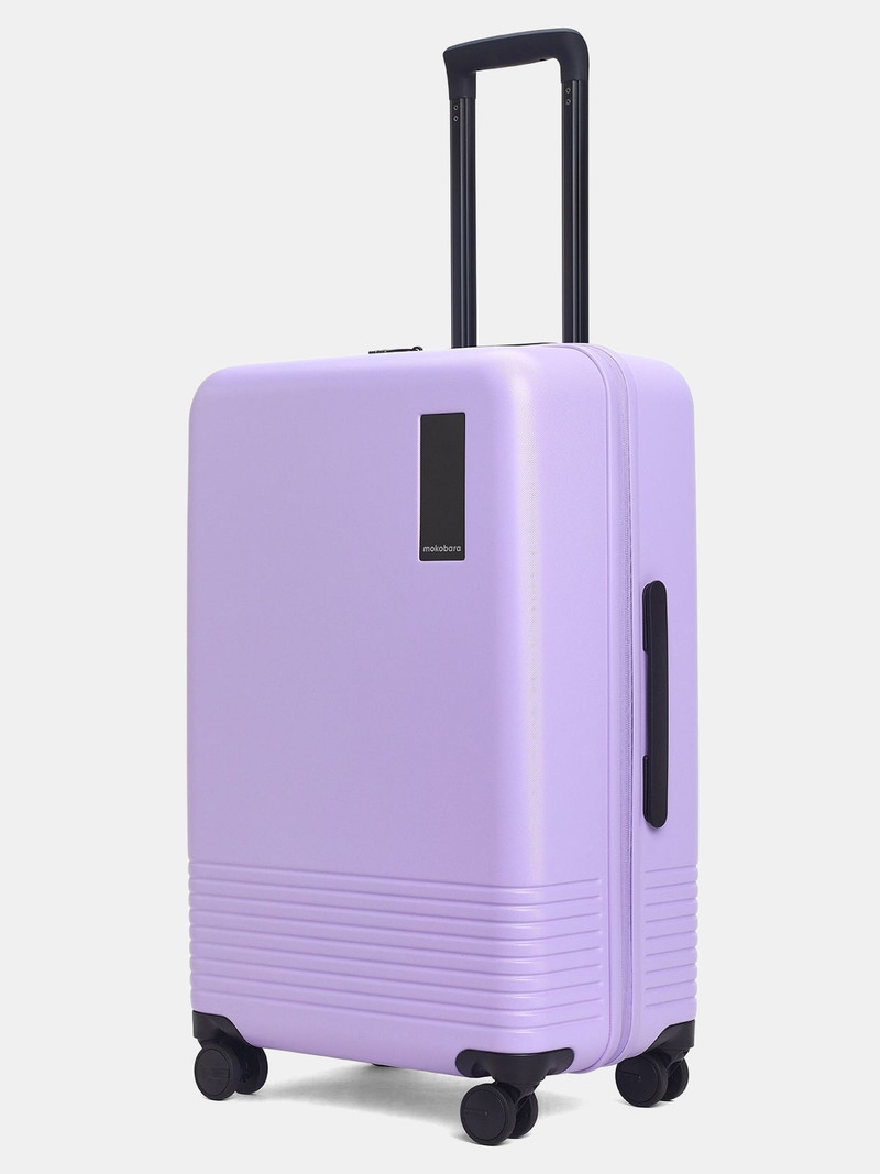 Mokobara Mokobara Medium Check-in Suitcase (68.5 cm) 8 Wheels - The Check-in Medium Luggage - Purple