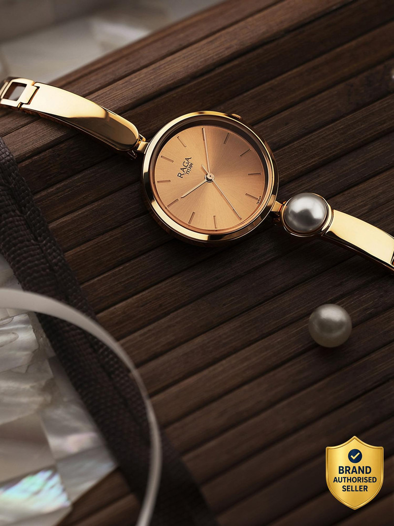 Titan Titan Raga Power Pearls RoseGold Dial RoseGold MetalStrap Analog Watch  - For Women NT2720WM01F,2720WM01F,NU2720WM01F