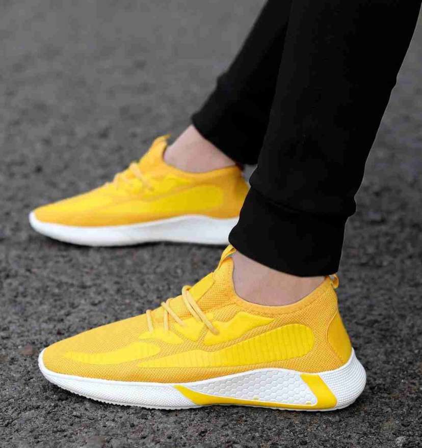 Yellow colour sports shoes on sale
