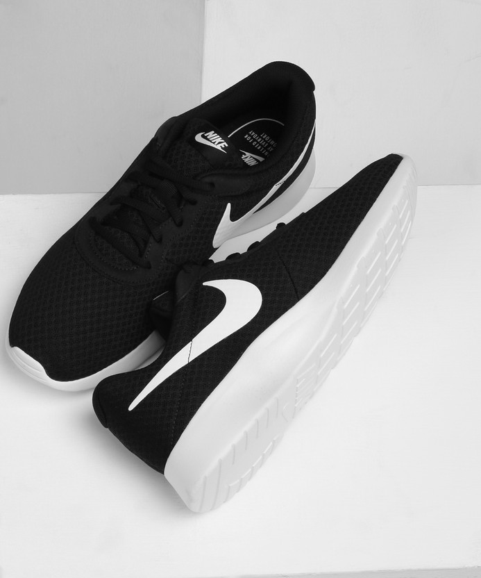 nike tanjun black white original