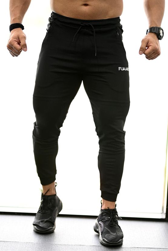 FuaarK Men Black, White Printed Track Pants - Image 1