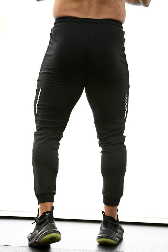 FuaarK Men Black, White Printed Track Pants - Image 2