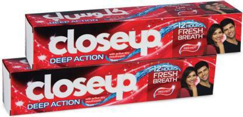 Closeup RED triple fresh formula red hot toothpaste Toothpaste