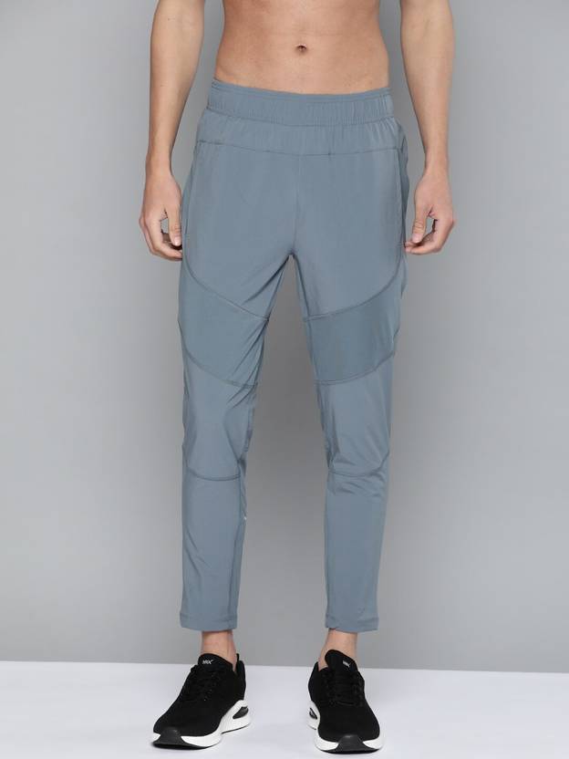 HRX by Hrithik Roshan Solid Men Blue Track Pants Buy HRX by Hrithik