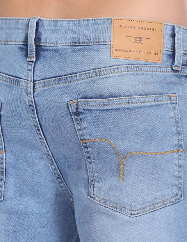 Men Tapered Fit Low Rise Blue Jeans