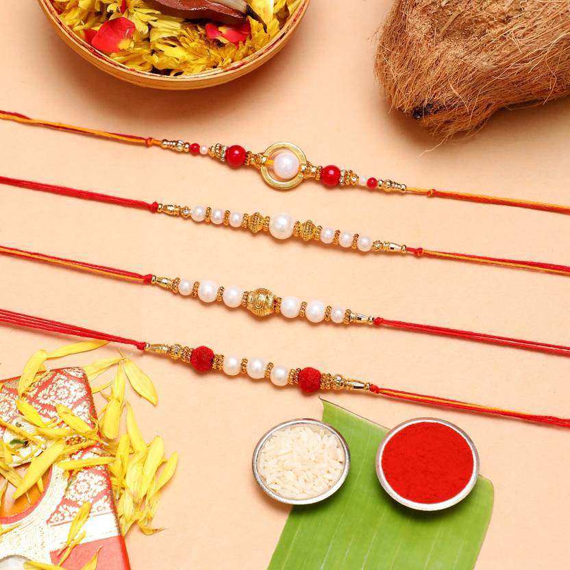 Designer Rakhi Gold Finish, Pearl Chawal Roli Pack, Rakhi Set (4 Rakhi with Roli, Chawal) deal from flipkart