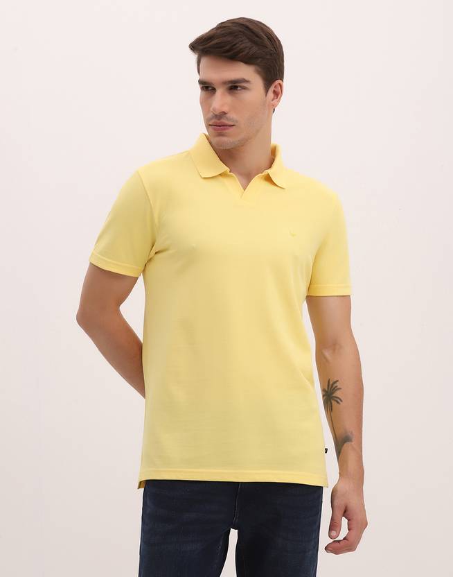 Blackberrys Solid Men Polo Neck Yellow T-Shirt
