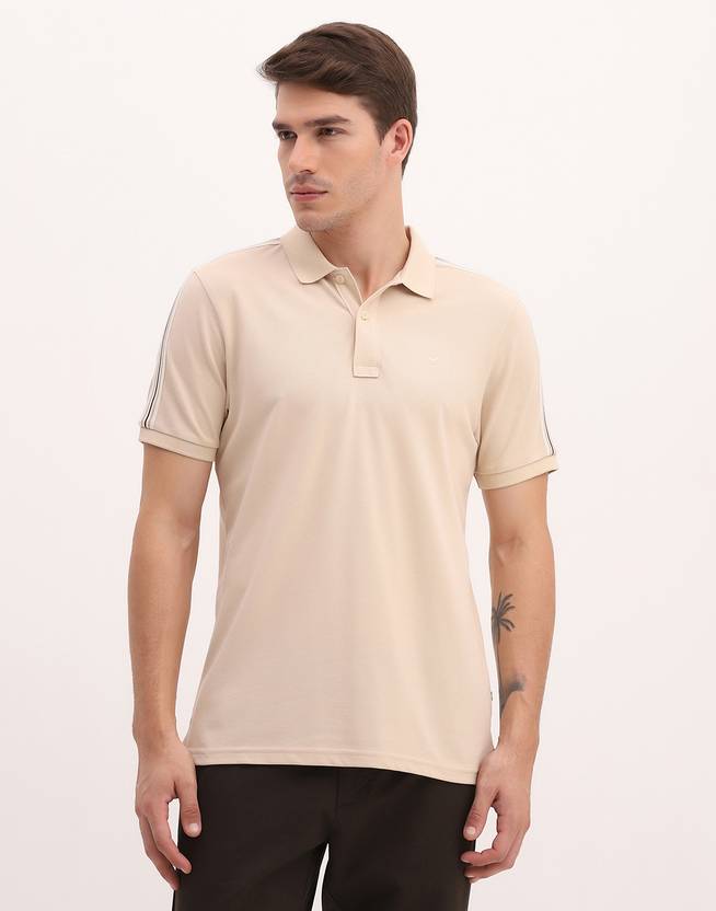 Blackberrys Solid Men Polo Neck Beige T-Shirt