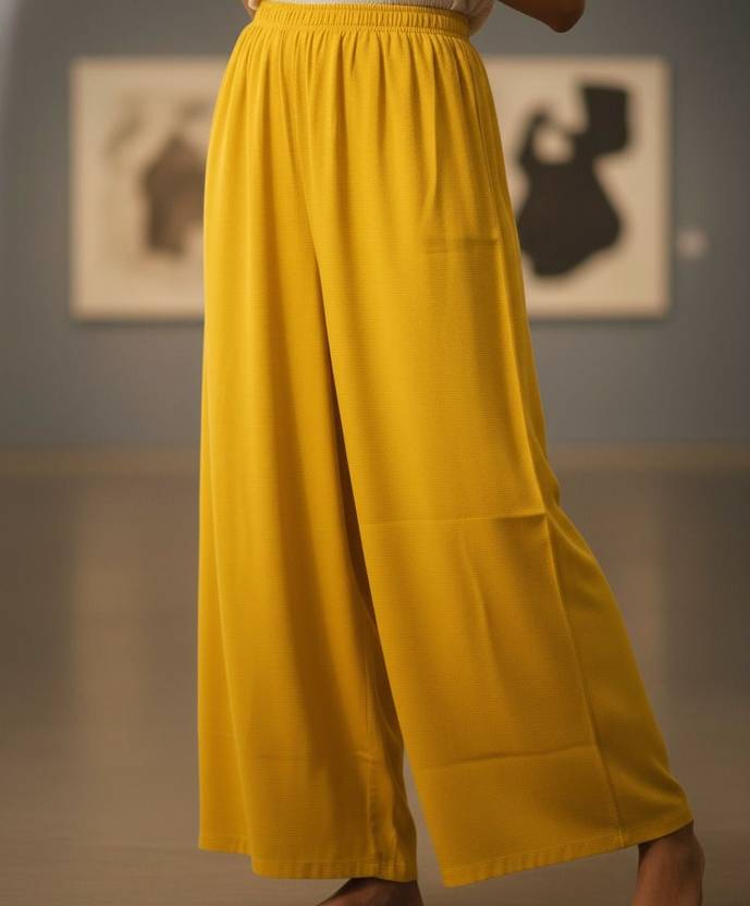 NOVIO Women Flared Yellow Cotton Blend Trousers